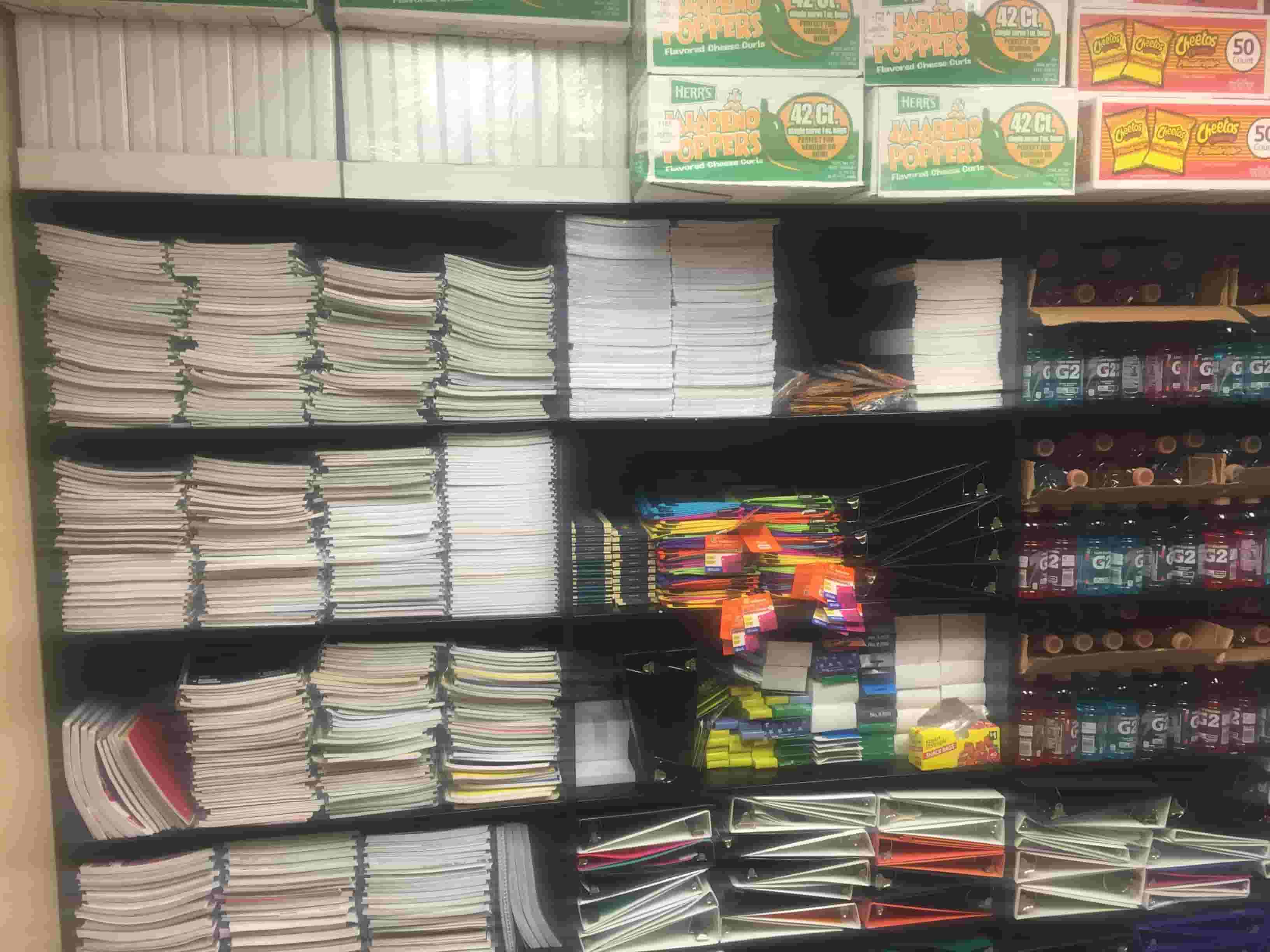 Darby Junior High store shelves stocked with notebooks, snacks, pens, and supplies